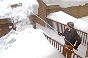 Why Hire A Roofer For Snow Removal