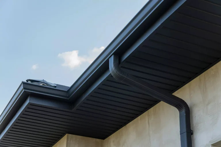 Black seamless guttering installed on a home.